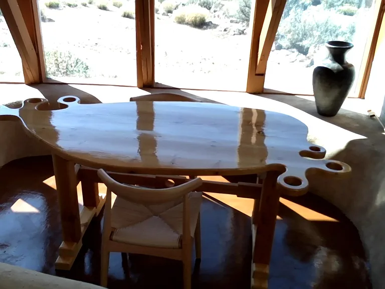 New breakfast nook table and solid wood chairs.