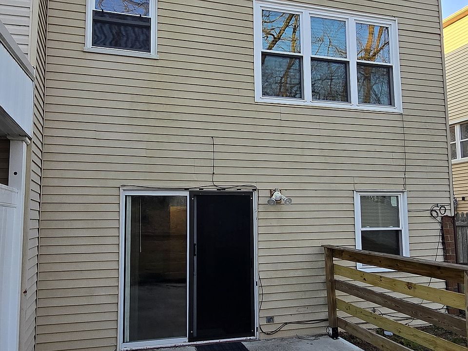 Finished backyard has a wooden fence