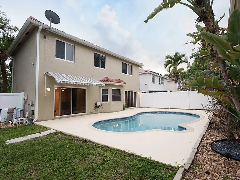 7251 NW 24th Ct — Photo 15