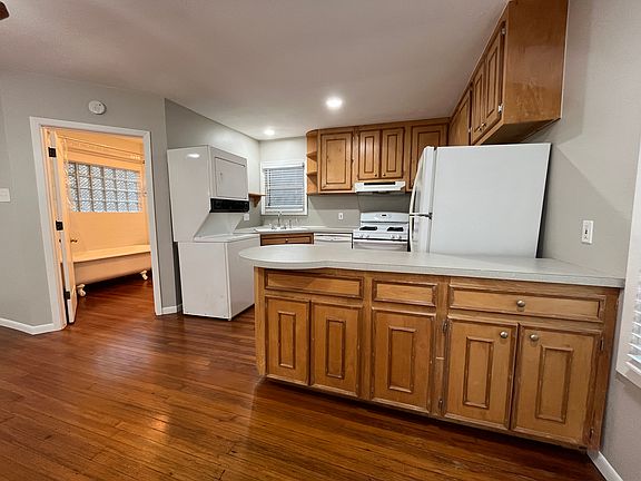 View of the kitchen and bathroom entry