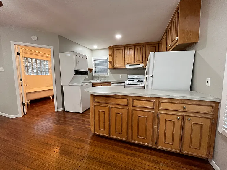 View of the kitchen and bathroom entry