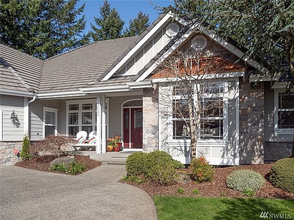 A peaceful oasis on all sides of this home. With covered porches and uncovered patios, enjoy the quiet setting all year.
