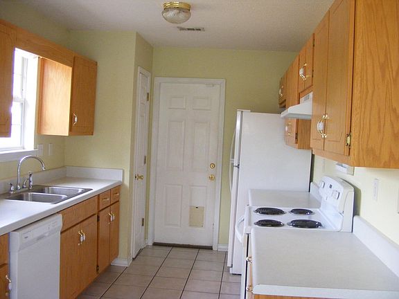 Kitchen leads to garage