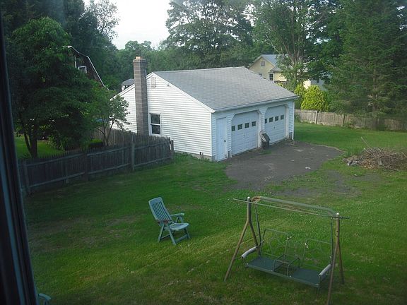 view from sunroom off living room detached garage