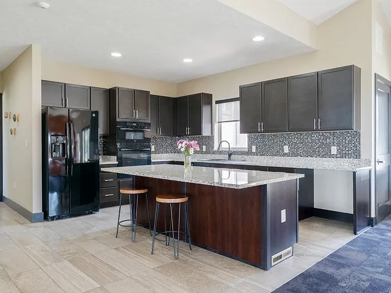 Our clubhouse kitchen is perfect for hosting gatherings, enjoying a coffee, or connecting with neighbors.