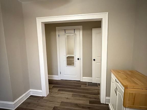 Walkway to bathroom and bedrooms