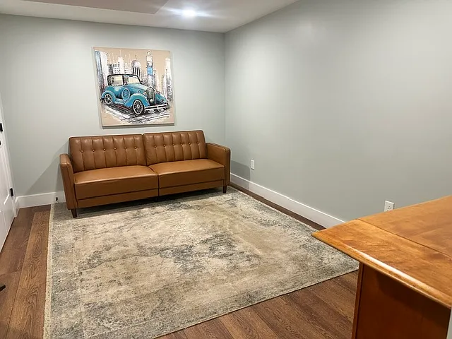 Fully renovated basement with it's own living room space.
