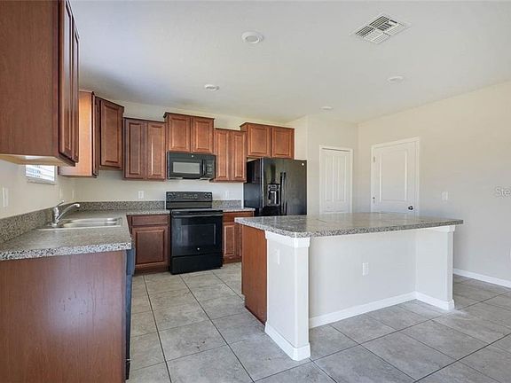 4th image of 2102 Purple Orchid Pl