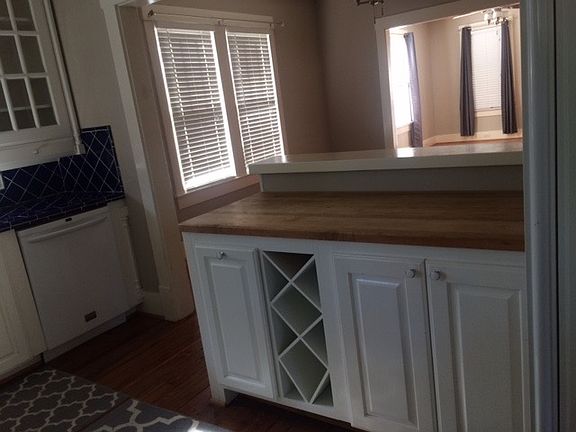Butcher Block, wine rack, pull out trash/recycle