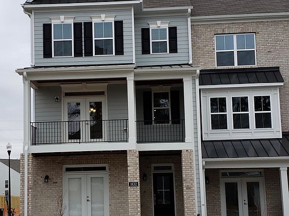 Quiet Austin Creek Subdivision. Call 877 255 1791 to schedule a showing. This New Townhome has lower porch and 2nd story porch with alcove for table and chairs. Lower porch patio leads to front door. A 3rd porch on 2nd level off living room is in the