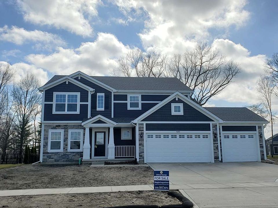 Situated on beautiful lot with mature trees, pond in front and back