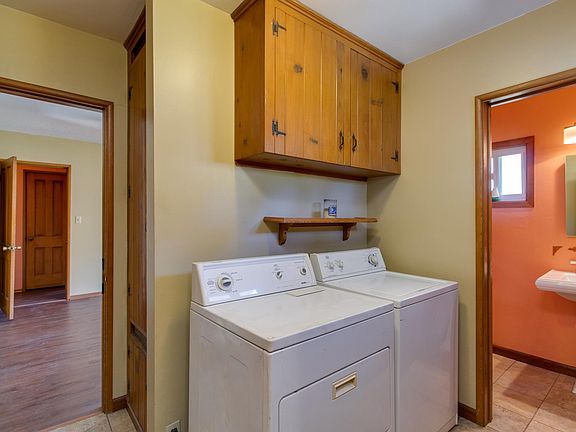 Laundry and 1/2 bathroom includes washer and dryer