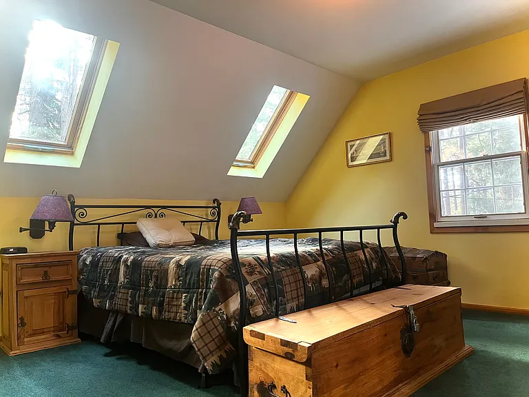 Master bedroom upstairs with plenty of natural light