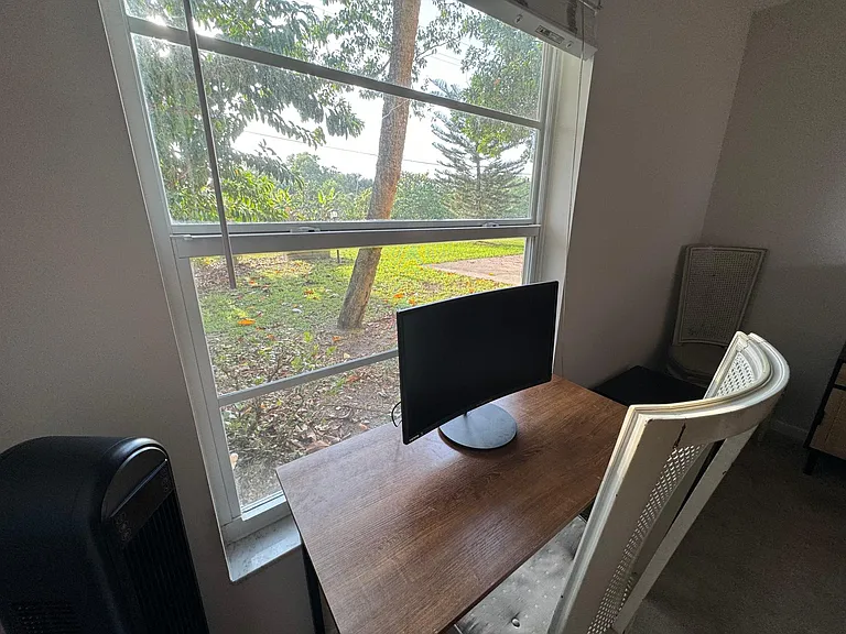 Desk in second bedroom facing out to yard