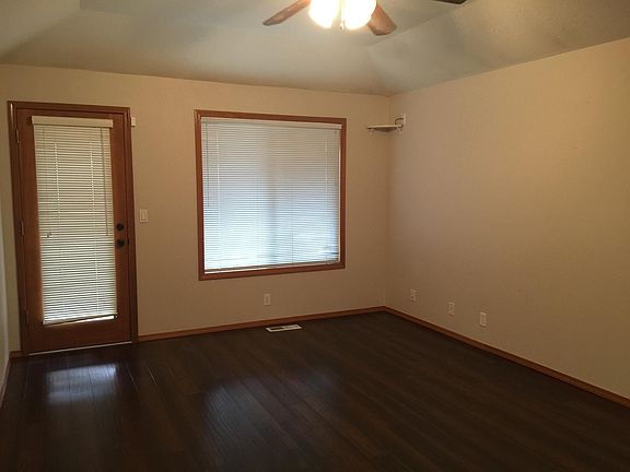 Primary bedroom with door entry to patio