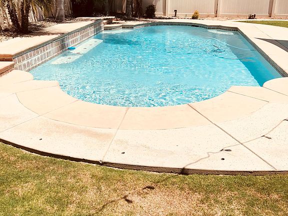 Banging Pool with water fall feature, upkeep paid by owner!