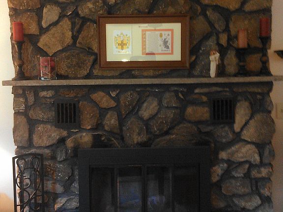 beautiful renovated stone fireplace