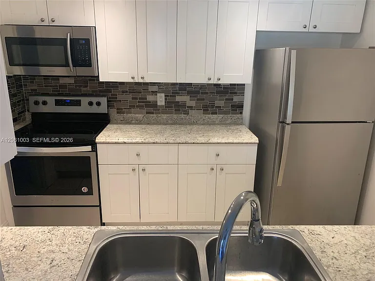 3246 N Pine Island Rd #101 — Photo 8