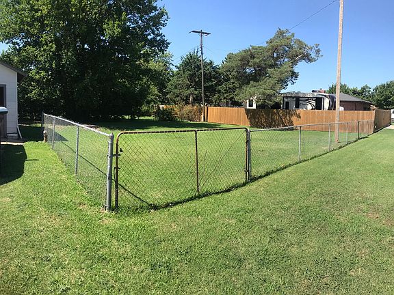 Rear fenced lawn