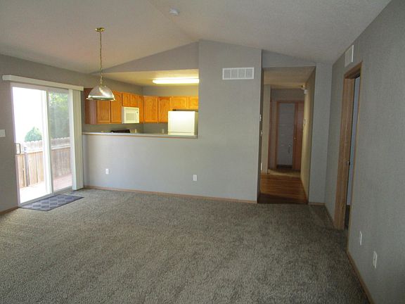 Living Room heading to kitchen, hall and bedrooms