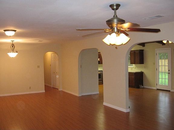 living room with arched entries