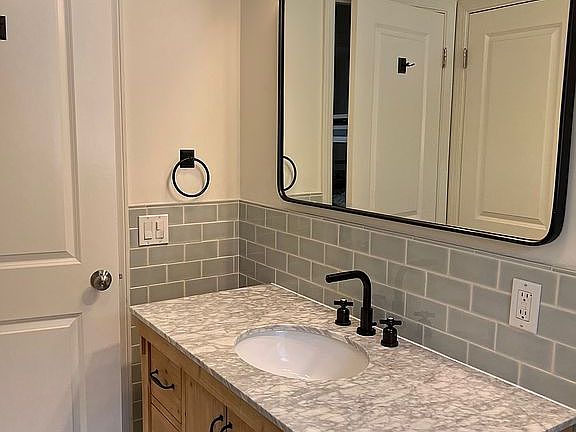 Full bathroom with tub