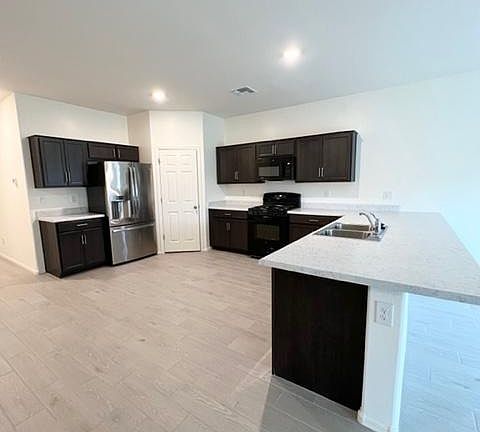 View of kitchen from dining room
