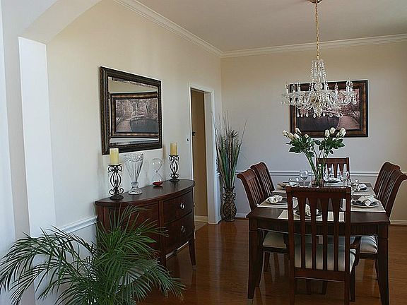 Wood floors in both formals and upstairs game room.