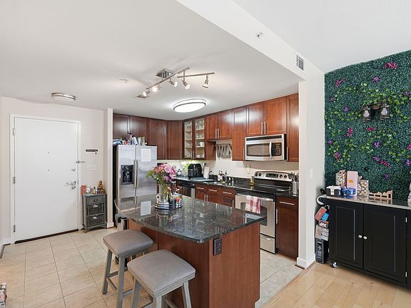 Bright kitchen with modern finishes and seamless flow into the main living space.