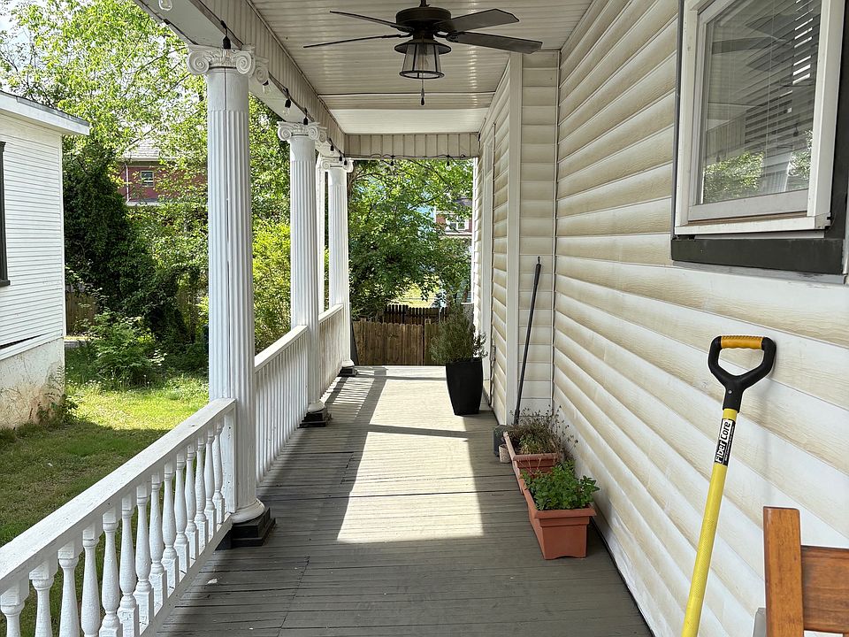 Side Porch leading to Shared Fenced In Backyard w/ Outdoor Ceiling Fan and New Solar Lights!