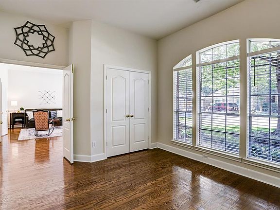 The study/bedroom features a large closet for storage, and double doors at entry!