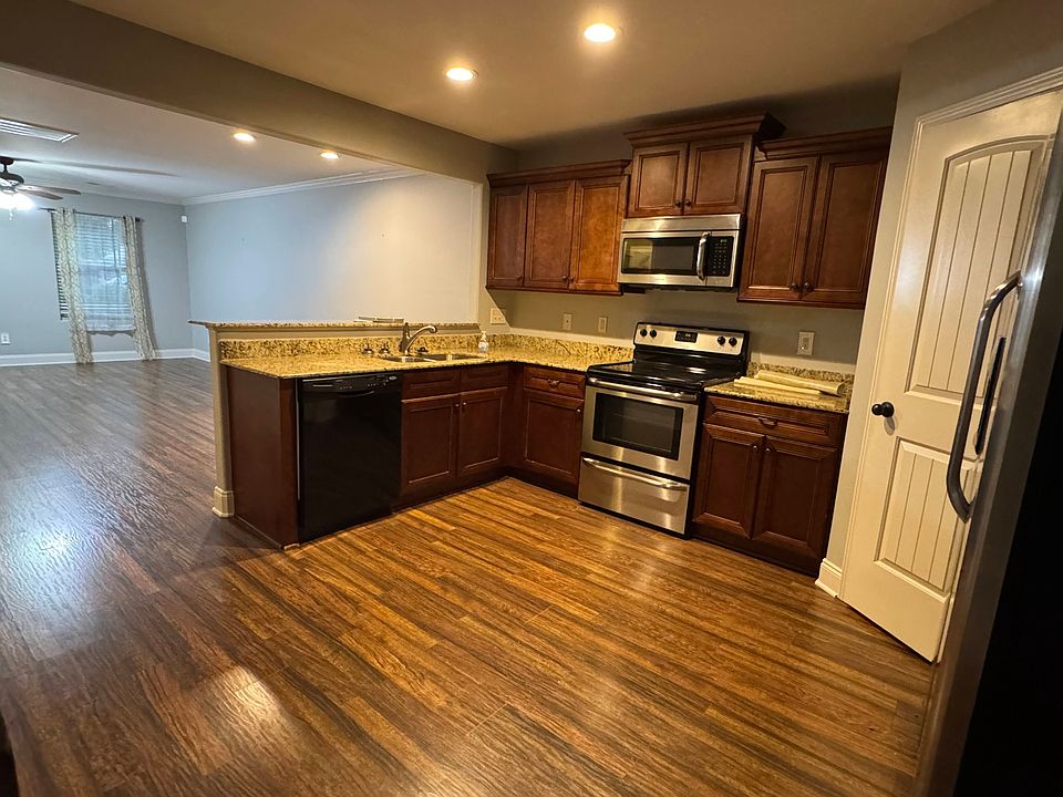 Kitchen, facing living room - door in the picture is the full pantry