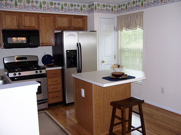 Kitchen at Rear of Home w/Island & Pantry