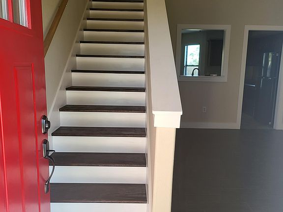 Entry into home with all new floors. NO CARPET!