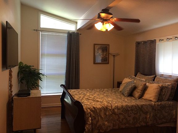 Master
						:
						The large master bedroom has vaulted ceilings, a walk-in closet, and bathroom.