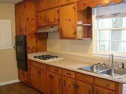 Large kitchen with gas range and oven