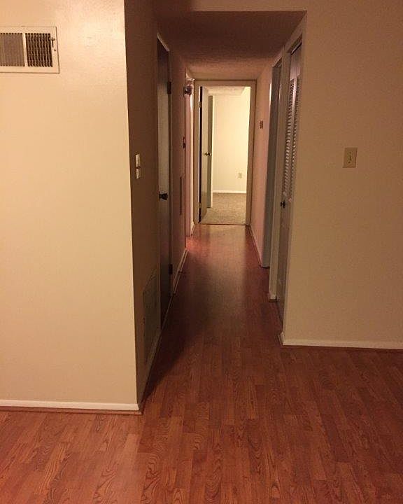 Hallway to 2 bedrooms/bath/laundry