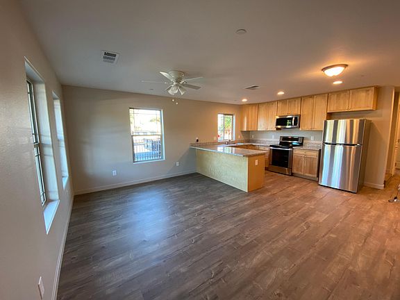 Light and open living room, kitchen and dining area floor plan