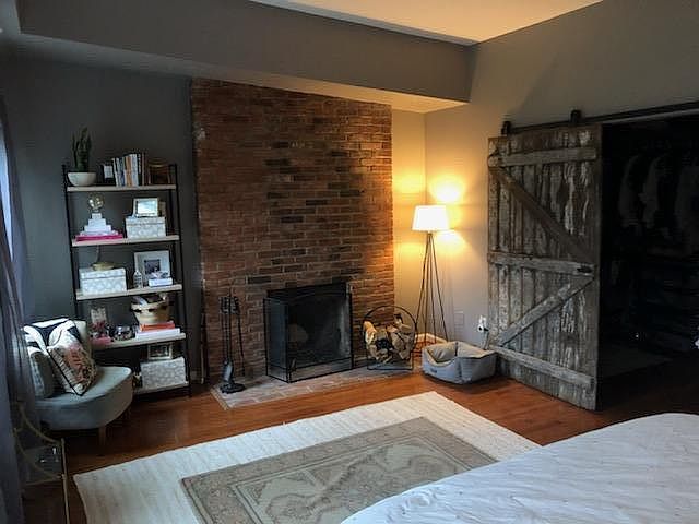 Master bedroom with working fireplace