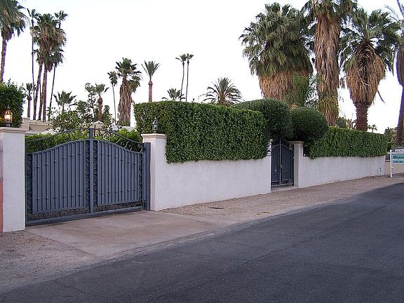 GATED & WALLED PRIVATE ENTRY