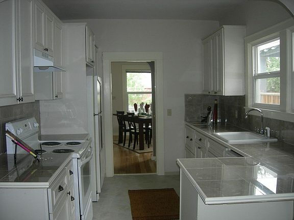 New Kitchen with New Cabinets, Marble Countertops and Flooring