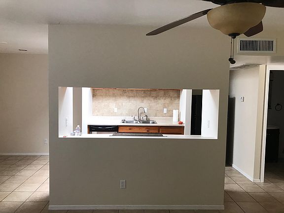 Living room looking into kitchen