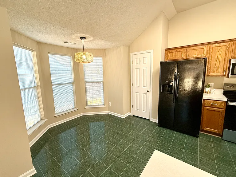 Breakfast room with bay window and new light