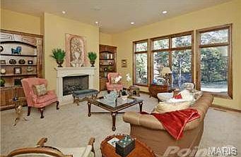 Focal point of the greatroom is the fireplace flanked by built i