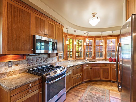Unique rounded kitchen with custom cabinets