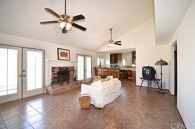 Living Room with two sets of double doors out to the balcony and gorgeous views!