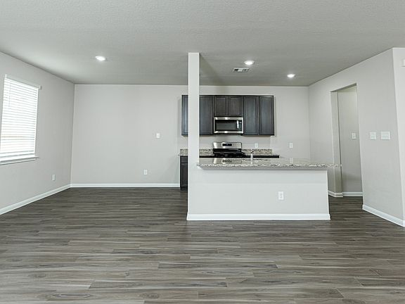 Family Room to Kitchen and Dining Area