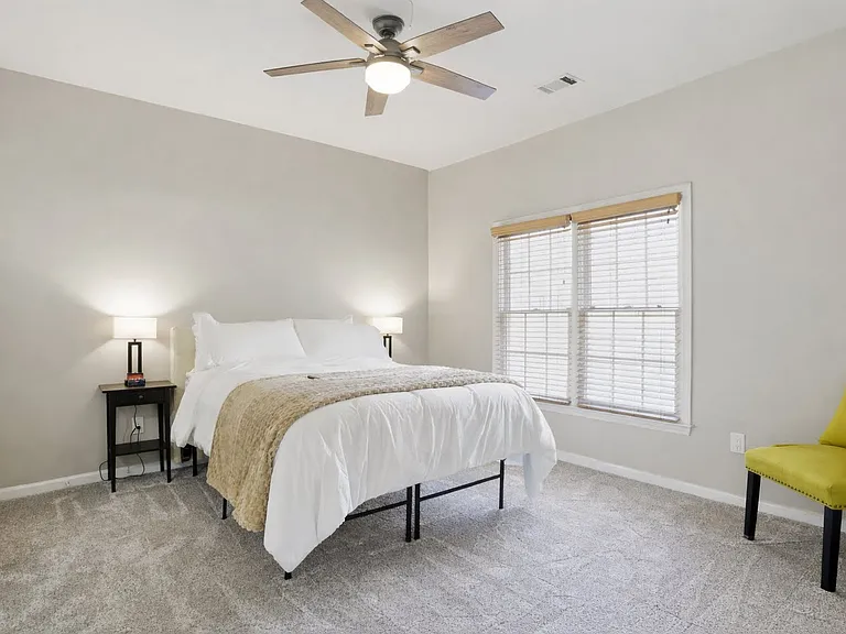 Bright guest bedroom with flexible use for extended stays
