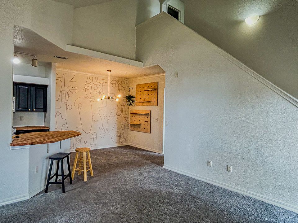 Living room looking at dining room and kitchen