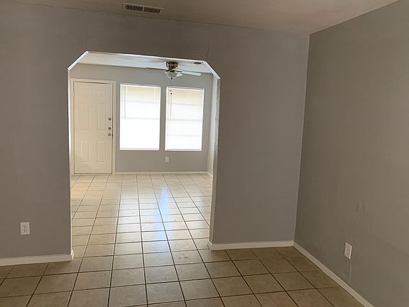 Open floor plan, tile throughout the home.